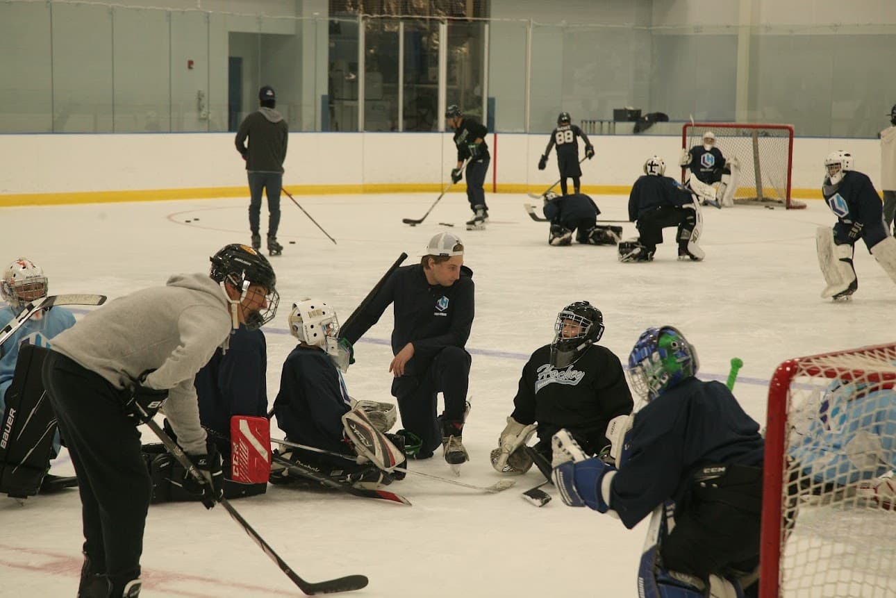 Goalies training on ice during LH Goaltending session
