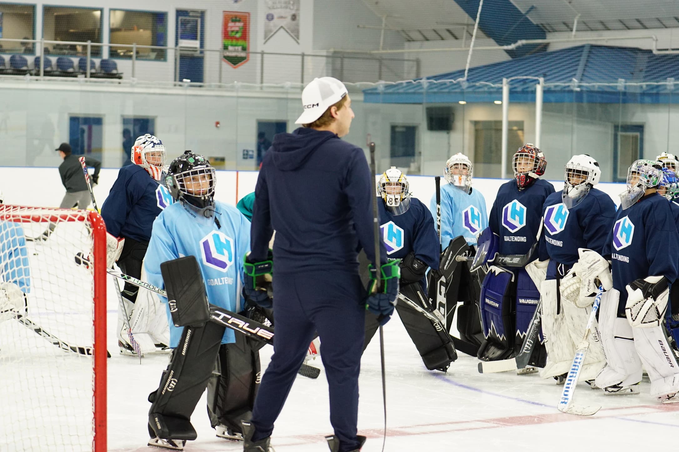 LH Goaltending camp — coach addressing group of goalies