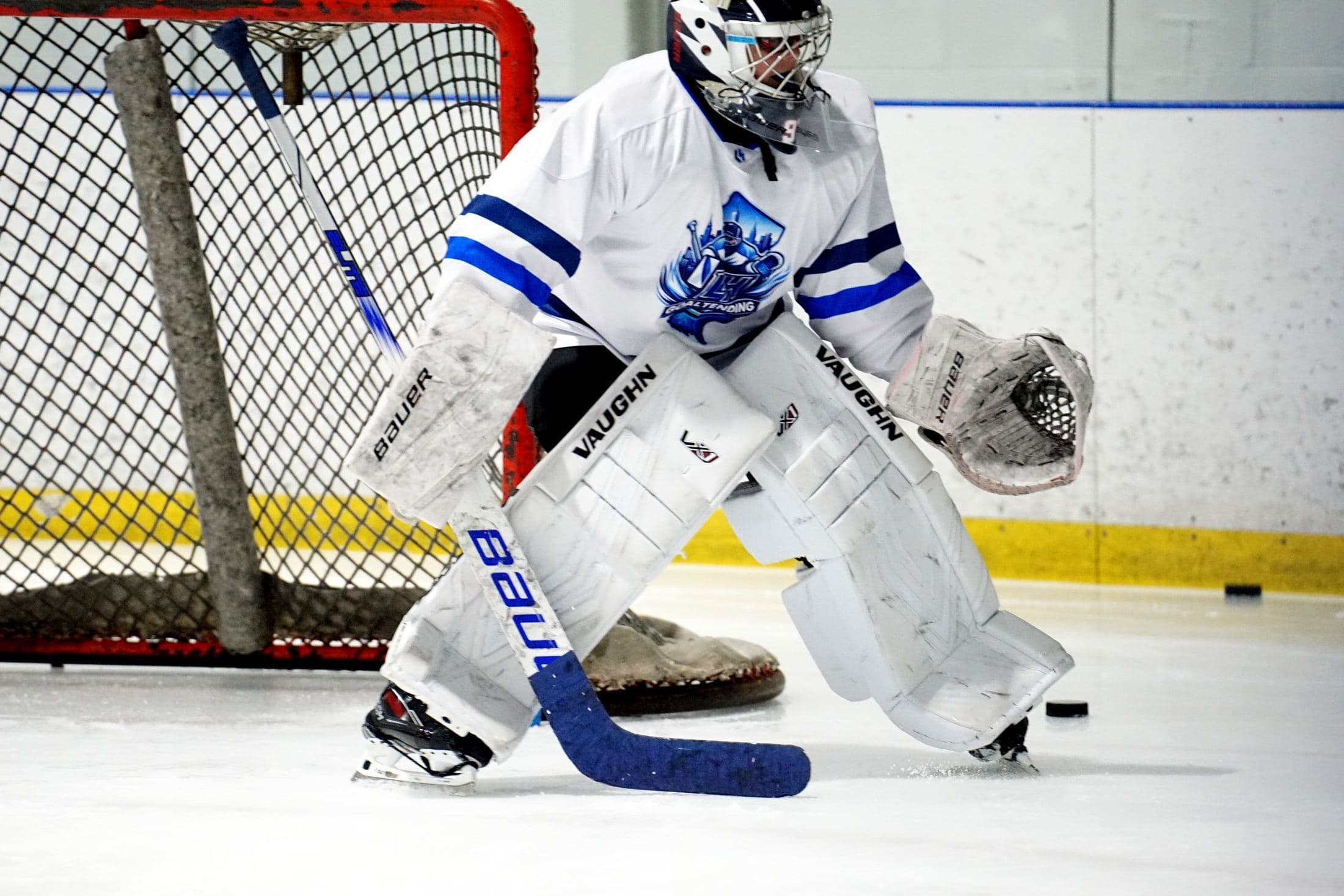 LH Goaltending goalie driving across the crease during an on-ice session
